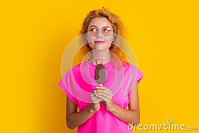 dreamy woman with icelolly ice cream in studio. woman with icelolly ice cream Stock Photo