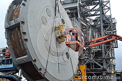 Dredge maintenance-replacing bucket wheel on site Yallourn opencut coal mine . Editorial Stock Photo