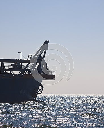 Dredger at sea Stock Photo