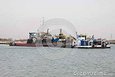 A dredger at work Stock Photo