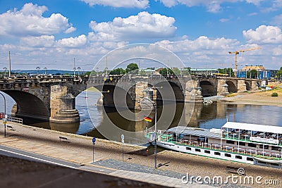 Dresden, Germany - June 28, 2022: Augustus bridge or Augustusbruecke on a sunny summer day. View from the Bruehl`s Terrace BrÃ¼ Editorial Stock Photo