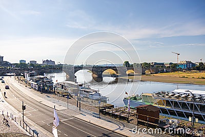 Dresden, Germany - June 28, 2022: Augustus bridge or Augustusbruecke on a sunny summer day. View from the Bruehl`s Terrace BrÃ¼ Editorial Stock Photo