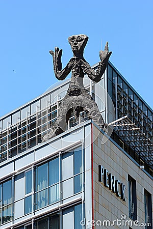 Dresden, Germany - June 3, 2023: Standart T(x), a sculpture by A.R.Penck on the roof of Penck Hotel Dresden. Editorial Stock Photo