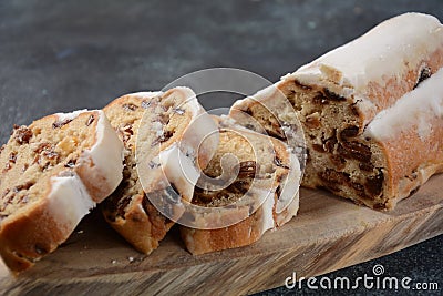 Dresdner Stollen is a Traditional German Cake with raisins. Gift for Christmas. Stock Photo