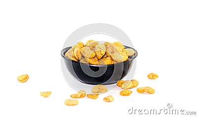 Dried beans overflow from a black plastic cup Stock Photo