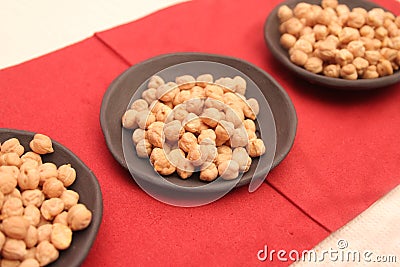 Dried chick peas in a bowl Stock Photo