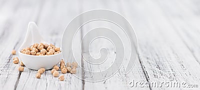 Dried Chickpeas on wooden background; selective focus Stock Photo