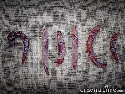 Dried chillies are placed on the table. Cooked with a spicy taste. Stock Photo