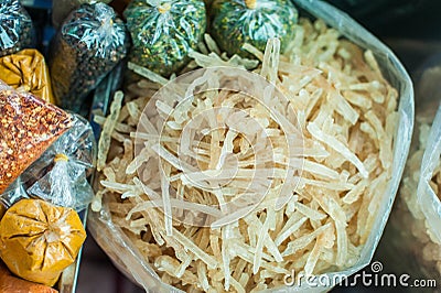 Dried coconut in a bag in the Vietnamese market. Stock Photo