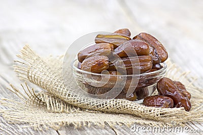 Dried dates in a bowl Stock Photo