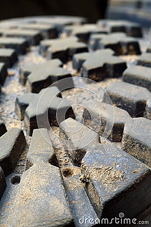 Dried dirt on the tread of the boot. close-up Stock Photo