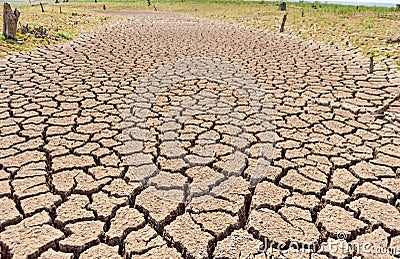 Dried earth because of rain dose not fall and the land lacked. Stock Photo