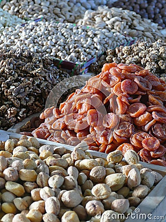 Dried fruit and roasted nuts for sale at the Chorsu market Tashkent Stock Photo