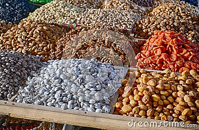 Dried fruit and roasted nuts for sale at the Chorsu market Tashkent Stock Photo