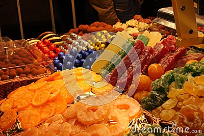 Dried fruit stand at the market La Boqueria, Barcelona Editorial Stock Photo