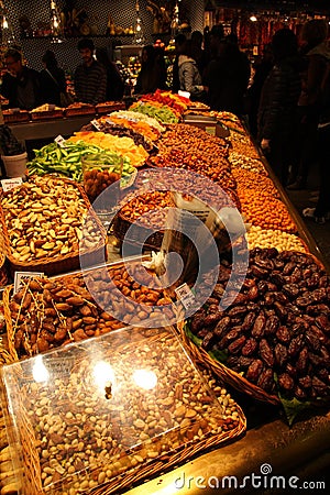 Dried fruit stand at the market La Boqueria, Barcelona Editorial Stock Photo