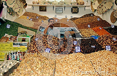 Dried fruit vendor in a Moroccan souk Editorial Stock Photo