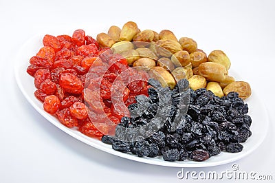 Dried Fruit on White Plate Stock Photo