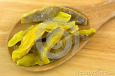 Dried Guava chips slices, preserved healthy snack on wooden spoon Stock Photo