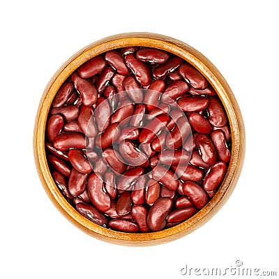 Red kidney beans, dried common kidney beans, in a wooden bowl Stock Photo