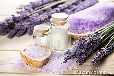 dried lavender flowers next to homemade bath salts Stock Photo