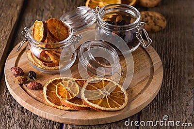 Dried Orange Chips on Wooden Tray Tasty and Healthy Snack for Tea or Coffee Above Stock Photo