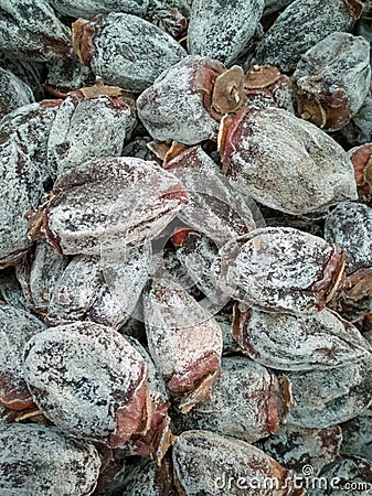 Dried persimmon close-up. Healthy dried fruit Stock Photo