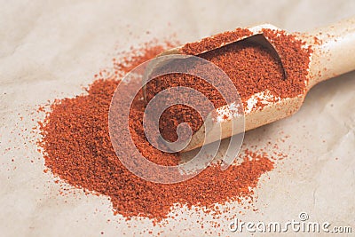 Dried red chili pepper in measuring spoon Stock Photo