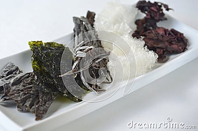 Top view of dried kelp, nori, dulse, wakame, alaria and agar agar seaweed Stock Photo