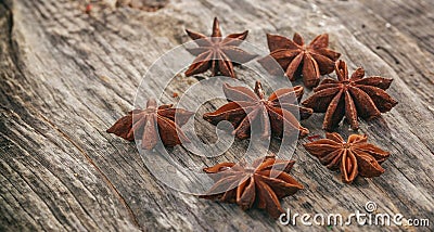 Dried star anises on a wooden surface Stock Photo