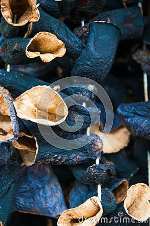 Dried zucchini or courgette over wooden background Stock Photo