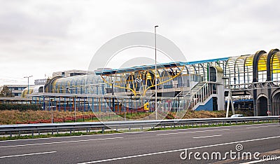 Dutch train station built over a highway Editorial Stock Photo