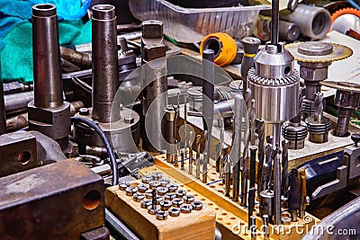 Drill chuck and other tools in a smith workshop Stock Photo