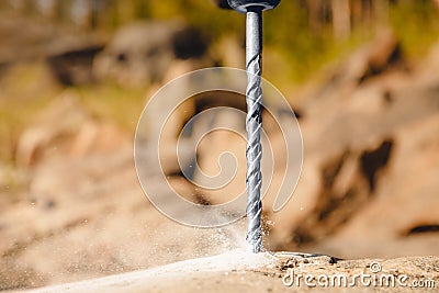 Drill for holes in stone and brick walls, professional tool Stock Photo