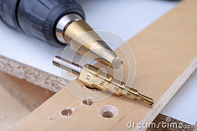 Drill in the shape of a cone for quick drilling. Accessories for mechanics Stock Photo