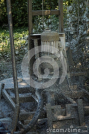 Drilling an artesian well on the territory of a private house Stock Photo