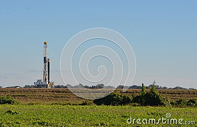 Drilling Rig in cotton field Stock Photo