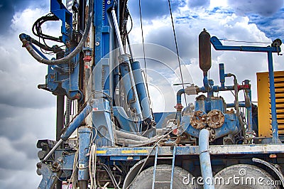 Drilling rig. Drilling deep wells in the bowels of the earth. Industry and construction. Mineral exploration - oil, gas and other Stock Photo