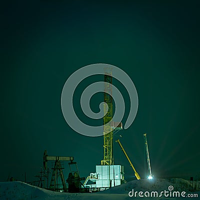 Drilling rig at night. Stock Photo