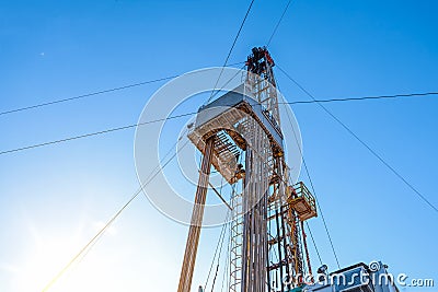 Drilling rig in oil field for drilled into subsurface in order to produced crude, inside view. Petroleum Industry. Onshore Stock Photo