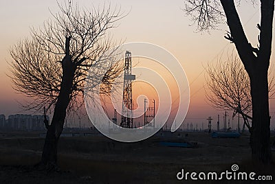 Drilling rig and trees Stock Photo