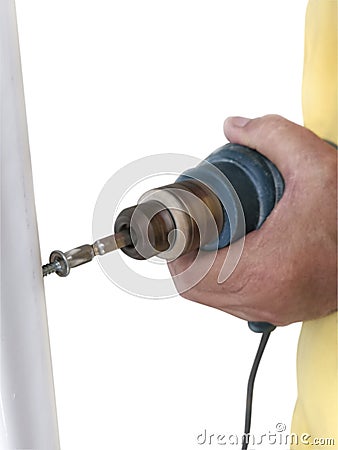Drills a holes with an electrical drill on background white Stock Photo