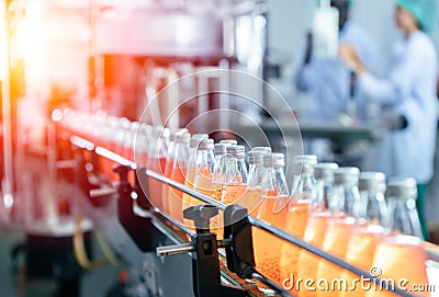 Drink factory production line fruit juice beverage product at conveyor belt Stock Photo