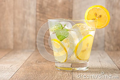 Drink for hot summer days. Fresh lime and lemon lemonade with mi Stock Photo