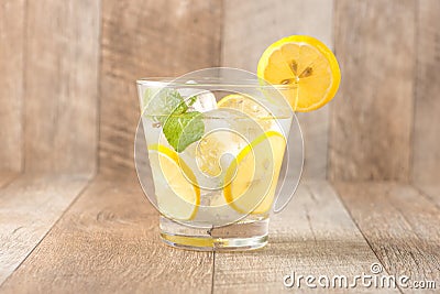 Drink for hot summer days. Fresh lime and lemon lemonade with mi Stock Photo