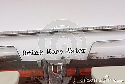 Drink More Water word typed on a Vintage Typewriter Stock Photo