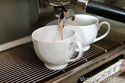 Coffee making machine pour cups caffeine dose Stock Photo