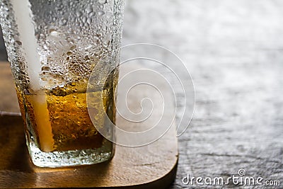 Drink of water droplets on wood plant Stock Photo