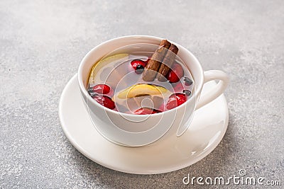 Drink from wild rose berries with lemon and honey cinnamon. Vitamin useful decoction of rose hips. Copy space Stock Photo