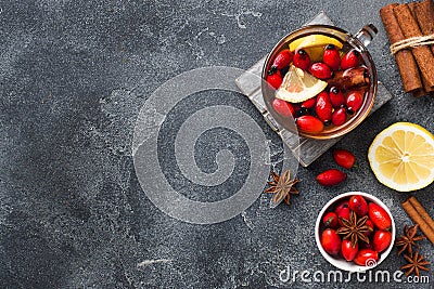 Drink from wild rose berries with lemon and honey cinnamon. Vitamin useful decoction of rose hips. Copy space Stock Photo